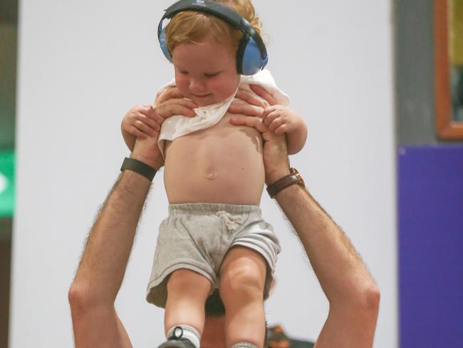 Hank Ward is lifted up by his father Matt at the NBL Blitz. Picture: Glenn Campbell.