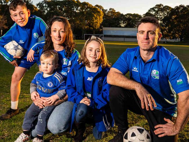 Charlotte and Michael Reimer with kids Bruce, 10, Chelsea, 7, and Luigi, 2, are  worried they won't be able to play soccer at UniSA Magill campus as its future is uncertain, pictured on July 2nd, 2024.Picture: Tom Huntley