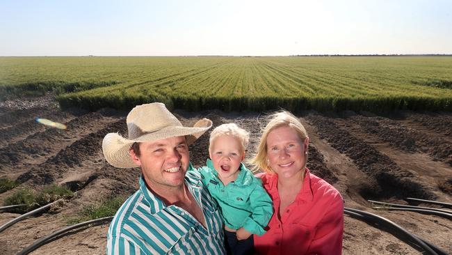 James and Fiona Paterson with their son, Will, on their property at Hay NSW. Picture: Yuri Kouzmin