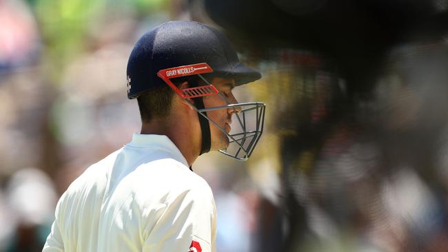 Alastair Cook departs after being dismissed by Mitchell Starc. Photo: Getty Images