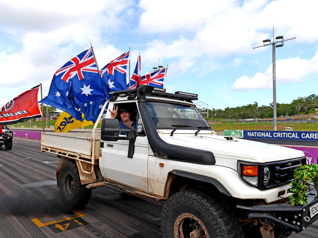 And they're off. Dozens of utes hit the road at Hidden Valley for the annual Variety NT Australia Day Ute run. Picture: Che Chorley