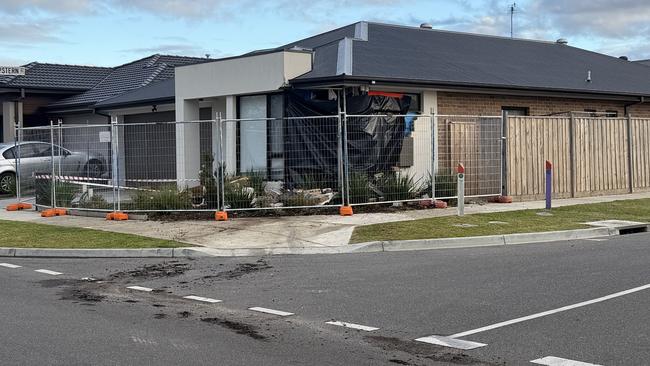 Damage to an Armstrong Creek home, cnr Eaglebay Rd and Shipstern St, after a car crashed into it. Picture: Ryan Bourke