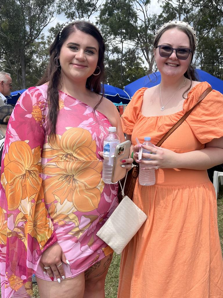 Tia Jaynsz and Emma Selway having fun at the Torbanlea Picnic Races.