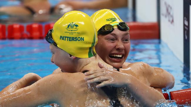 Elliott is congratulated by silver medallist Lakeisha Patterson after winning gold in the Women's 50m Freestyle in Rio. Pic: Buda Mendes/Getty Images