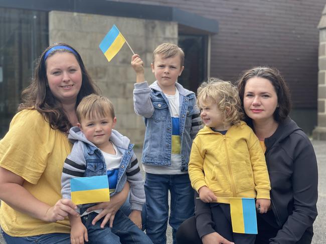 Iryna Brazhnikova with her children Maxim and Denis, and Olena Naumenkova with her child Michael.