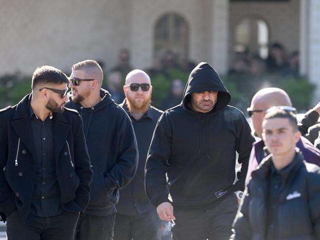 Mourners gather at the funeral of Alen Moradian at Greenfield Park on Wednesday.