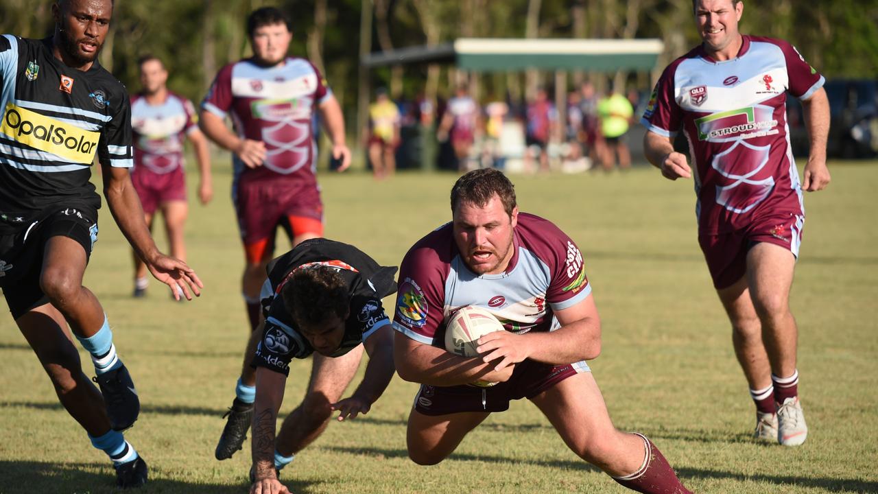 Royce Blair goes over for one of his two tries for the Isis Devils.