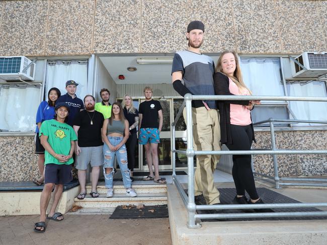 21.4.2020.Backpackers in Loxton have been getting hard time from locals, with bins at the local hostel graffitied with go home signs. Local backpackers Milan Scheunemann and Kristina Welters from Germany with fellow backpackers. PIC TAIT SCHMAAL.