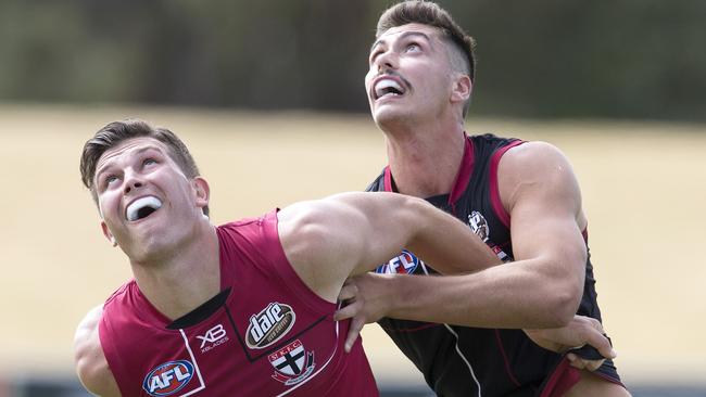 Rowan Marshall and Lewis Pierce go head to head at Saints training. Picture: Michael Klein