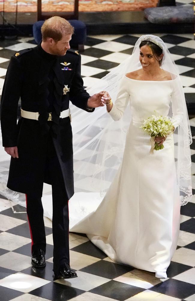 Britain's Prince Harry and Meghan Markle leave after their wedding ceremony at St. George's Chapel in Windsor Castle in Windsor, near London, England, Saturday, May 19, 2018. Picture: Owen Humphreys/AP