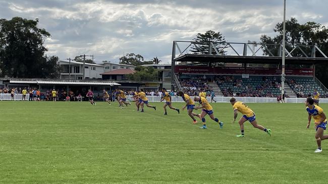 Warilla-Lake South Gorillas kicking off against Shellharbour Sharks. Photo: Kevin Merrigan