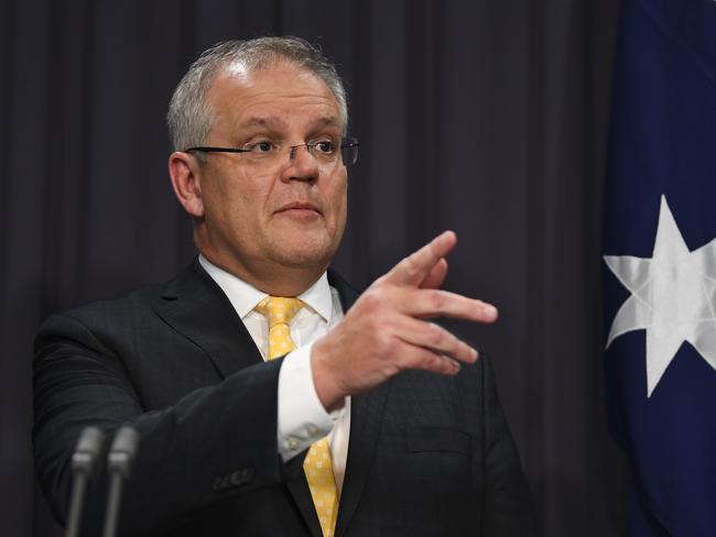 CANBERRA, AUSTRALIA - MARCH 24: Australian Prime Minister Scott Morrison addresses the media and the nation during a press conference at Parliament House on March 24, 2020 in Canberra, Australia. Morrison has revealed new restrictions Australia-wide from midnight tomorrow to help prevent the spread of COVID-19. There are now 2,139 confirmed cases of COVID-19 in Australia and the death toll now stands at eight. (Photo by Lukas Coch - Pool/Getty Images)