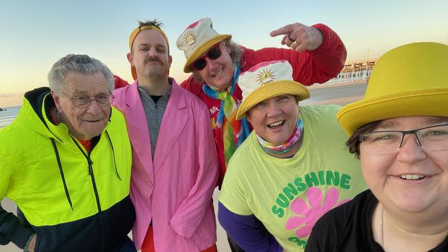 Some of the Coffs Harbour Fluro Friday tribe Ian South, Nick Newling, Dom White and Tegan McVey, at the Jetty Beach.