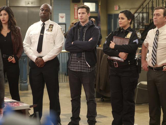 The <i>Brooklyn Nine-Nine </i>cast: Stephanie Beatriz, Andre Braugher, Andy Samberg, Melissa Fumero and Joe Lo Truglio. Picture: Jordin Althaus/NBC via AP