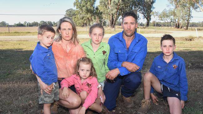 The Conroy family — Will, 4, Jess, Isla 6, Anna, 8, John, and Jack, 10 — fear the impact the proposed $750 million Meadow Creek Solar Farm will have on their farm at Bobinawarrah in north east Victoria.