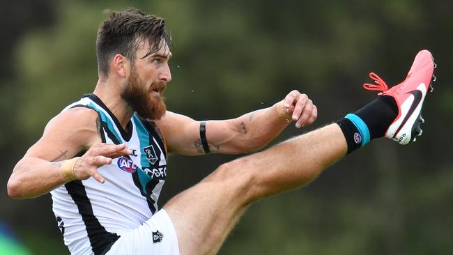 Charlie Dixon of the Power kicks a goal during the AFL Marsh Community Series pre-season match between the Brisbane Lions and the Port Adelaide Power at the Moreton Bay Central Sports Complex in Burpengary, Queensland, Sunday, February 23, 2020. (AAP Image/Darren England) NO ARCHIVING, EDITORIAL USE ONLY