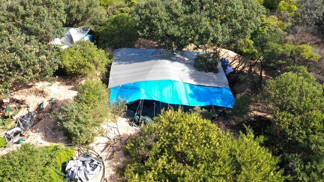 A makeshift campsite, photographed in August 2023, set up by homeless people in the sand dunes at Dee Why Beach. Picture: Manly Daily