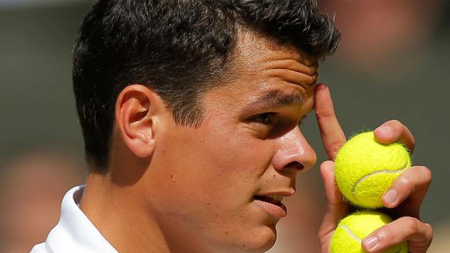 Canada's Milos Raonic prepares to serve against Britain's Andy Murray.