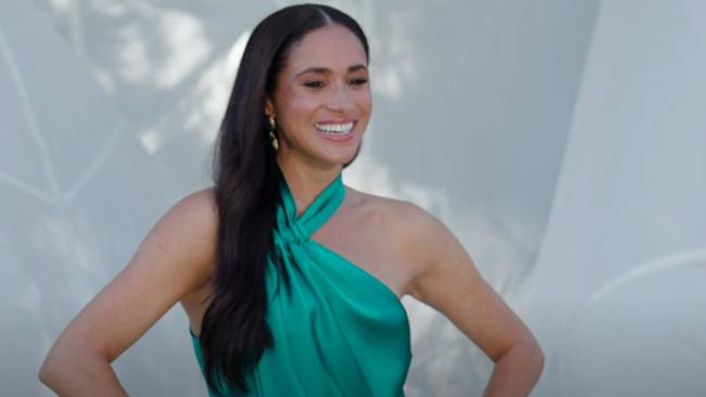 Meghan Markle posing in an emerald green halterneck dress for Variety. Picture: Variety