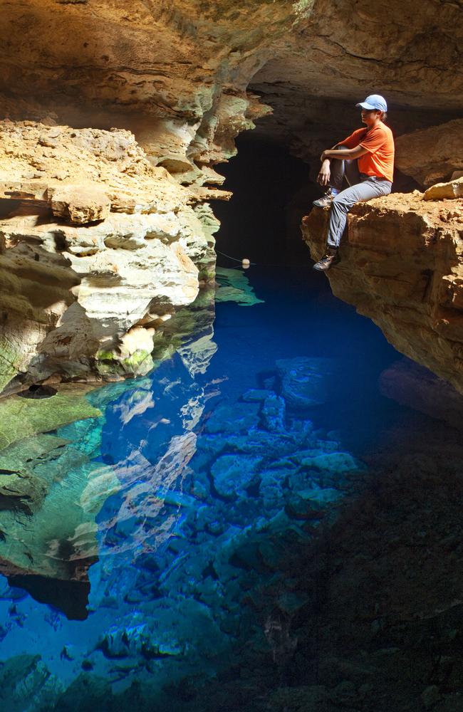 PIC FROM CATERS NEWS - (PICTURED: Beautiful pool in Brazil ) - At first glance, youd be forgiven for thinking the wondrous cave was just an empty bottomless pit. But do a double take and youll actually find the depths of the Poo Azul cavern, in Chapada Diamantina National Park, Brazil, have actually been flooded with a mystical INVISIBLE POOL. Photographer Marcio Duranc, 40, captured the sheer magnificence of the vast, 16m deep underground cave, which was discovered by a prospector in 1920 when looking for diamonds in the region. SEE CATERS COPY.