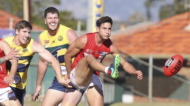 Aidan Tropiano gets his kick away on Sunday. Picture Sarah Reed