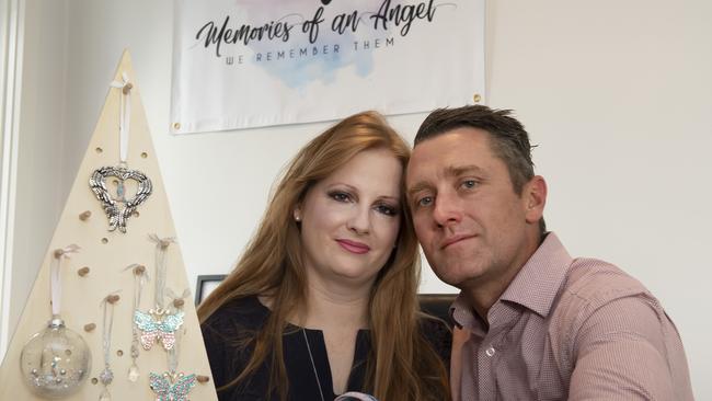 Samantha Rowe and her husband Paul at home in Heidelberg West. The couple has lost nine babies, and has started a foundation to offer support to other bereaved parents. Picture: Andy Brownbill