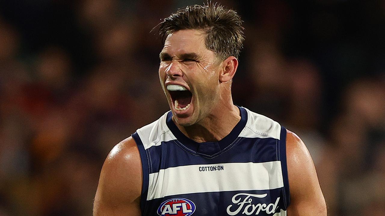 ADELAIDE, AUSTRALIA - MARCH 22: Tom Hawkins of the Cats celebrates a goal during the 2024 AFL Round 2 match between the Adelaide Crows and the Geelong Cats at Adelaide Oval on March 22, 2024 in Adelaide, Australia. (Photo by Sarah Reed/AFL Photos via Getty Images)