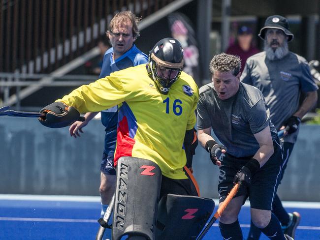 Action in the Pan Pacific Masters Games Hockey tournament. Picture: Glenn Campbell