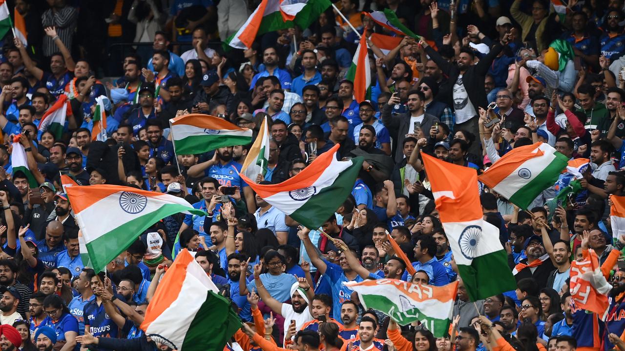 MELBOURNE, AUSTRALIA - OCTOBER 23: Fans show their support during the ICC Men's T20 World Cup match between India and Pakistan at Melbourne Cricket Ground on October 23, 2022 in Melbourne, Australia. (Photo by Quinn Rooney/Getty Images)