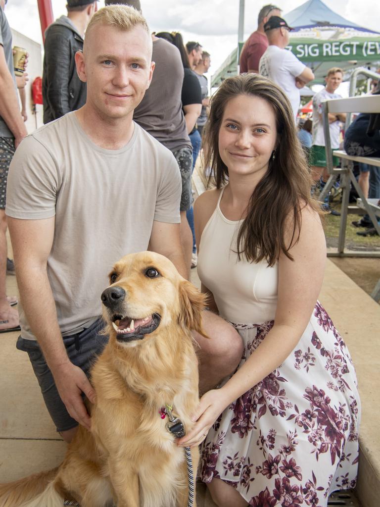 Chris Shepherd and Josie Madden-Smith with Luna the dog. Brett Forte Super 10s Memorial Rugby Challenge. QPS vs The Army. Saturday, August 14, 2021. Picture: Nev Madsen.