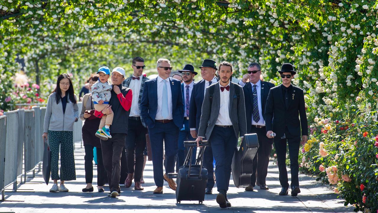 Punters walking up the Member’s Walk. Picture: Jay Town