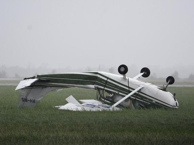 A plane flipped at Bowen Airport. Picture: Sarah Motherwell/AAP