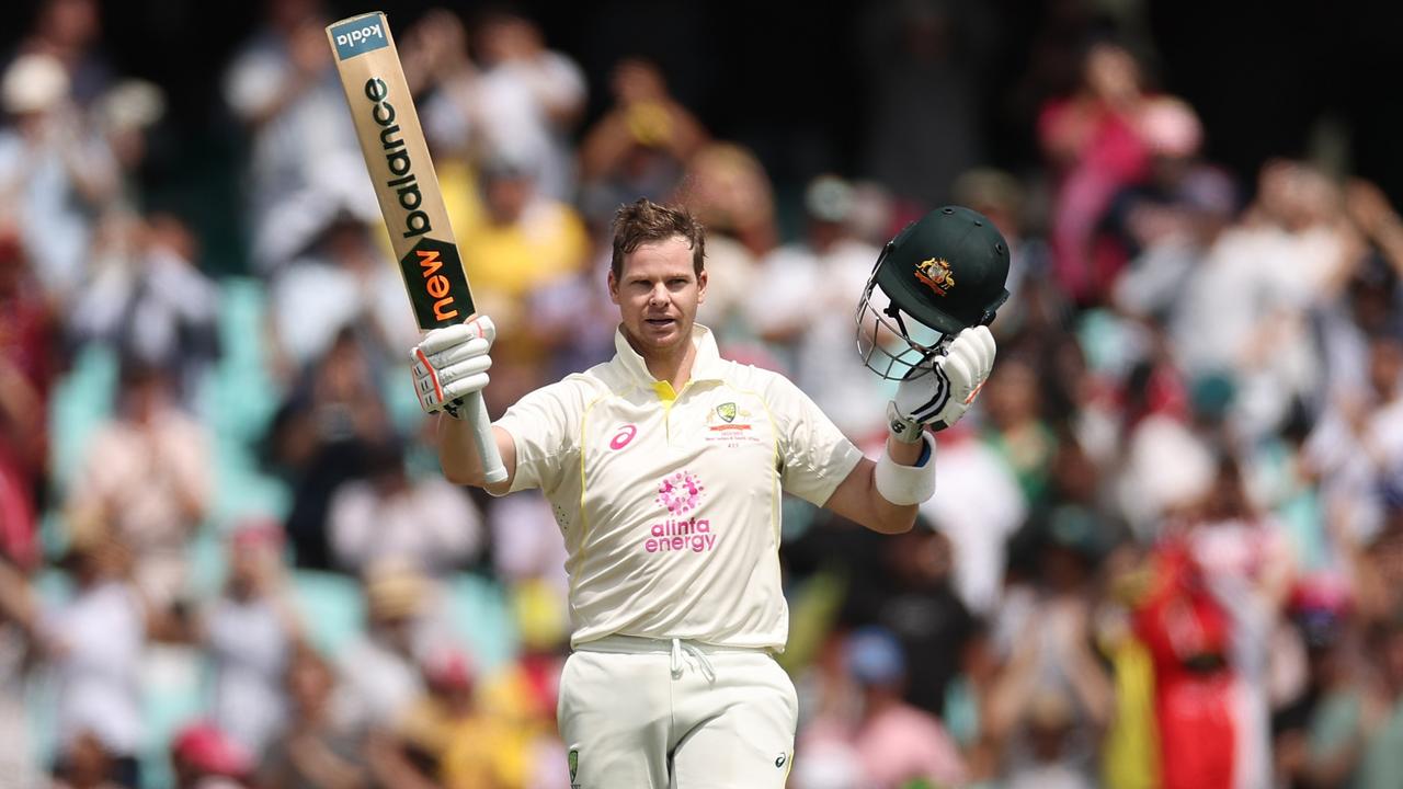 Steve Smith salutes after passing Bradman’s century mark. Picture: Cameron Spencer/Getty