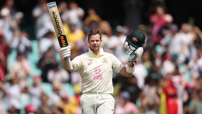 Steve Smith salutes after passing Bradman’s century mark. Picture: Cameron Spencer/Getty