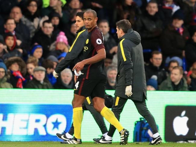 Vincent Kompany of Manchester City is taken off injured.