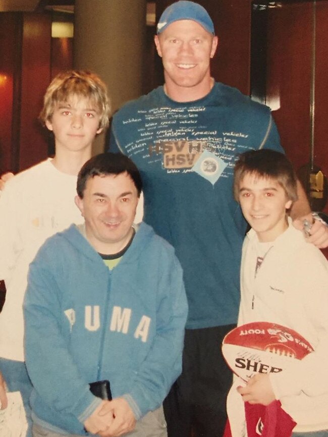 Barry Hall (centre) with star boxer and Swans fan Jason Moloney (right), then aged 13. Picture: Supplied