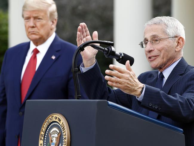 Dr Anthony Fauci and President Trump. Picture: AP