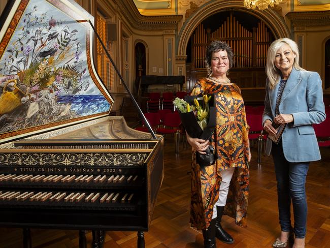 Artist Deborah Wace and Arts Minister Elise Archer beside the new harpsichord purchased by donated funds for Van Diemen's Band. (Supplied: Richard Jupe)