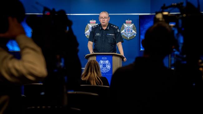 Chief Commissioner Graham Ashton reads a prepared statement after the royal commission was announced. Picture: Jake Nowakowski