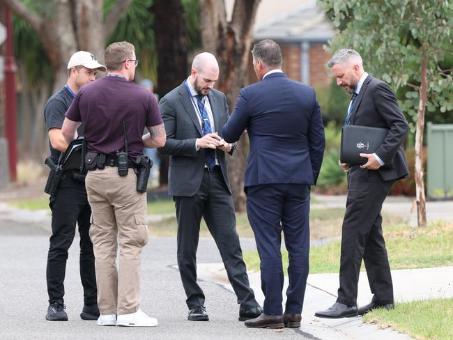 Detectives at the scene on Thursday. Picture: David Crosling