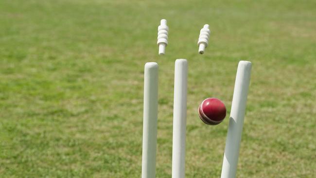 Cricket ball hitting stumps