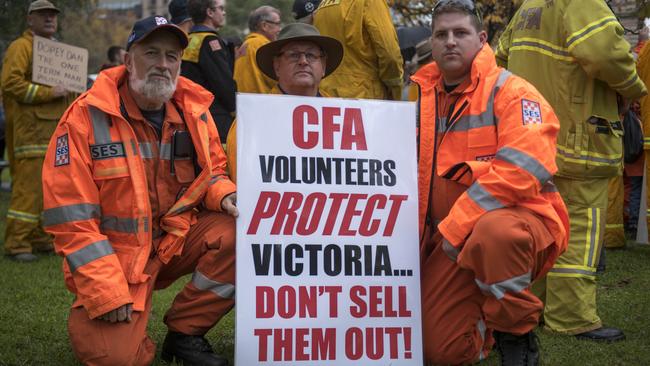 Angry and frustrated volunteer firefighters gather in Melbourne. Picture: Christopher Chan.