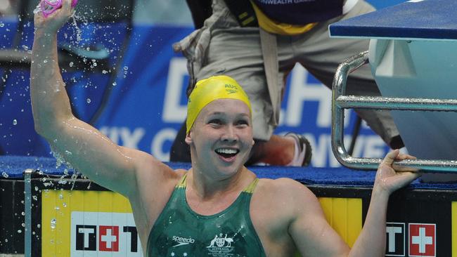 Swimmer Kylie Palmer of Australia celebrates after victory in the women's 200 freestyle final of the 2010 Commonwealth Games at The SP Mukherjee Stadium in New Delhi.