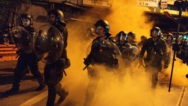 The Public Order Response Team and Victoria Police arrive in Richmond. Picture: NewsWire/Diego Fedele