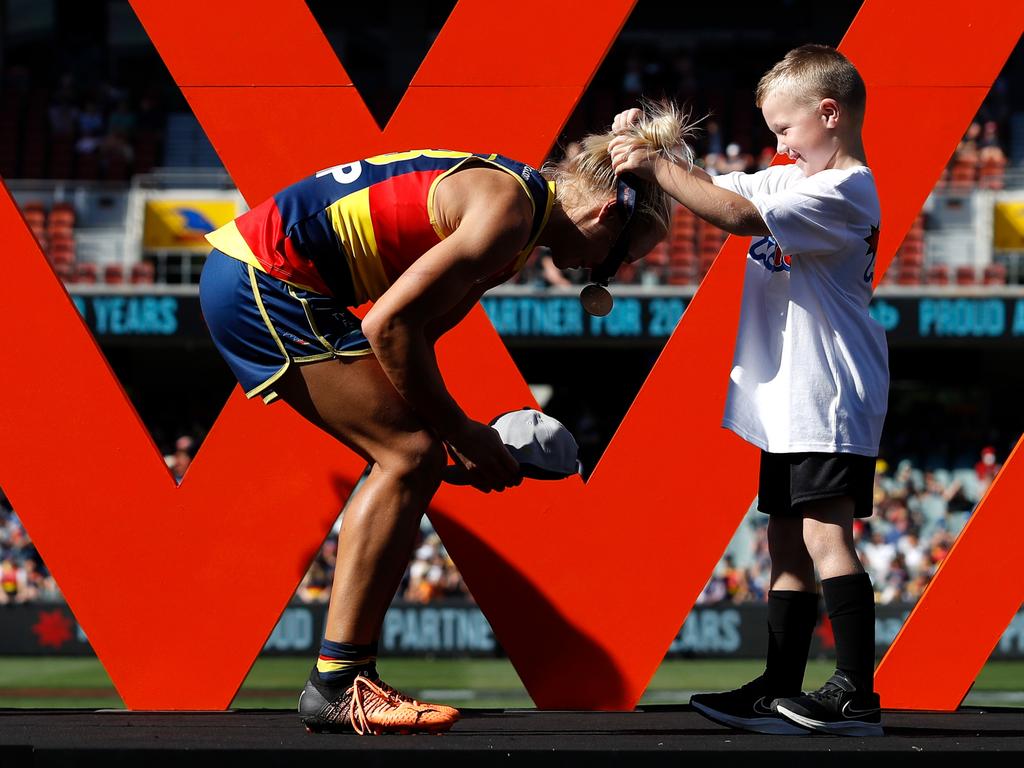 Phillips receives her third AFLW premiership medal on April 9, 2022. Picture: Getty Images