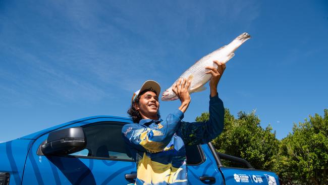 Keegan Payne with his million dollar barramundi. Picture: Pema Tamang Pakhrin