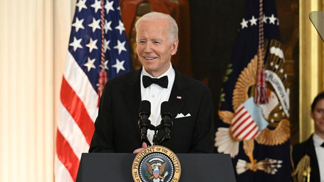 President Biden speaks during a reception for the Kennedy Center Honorees in the East Room of the White House on December 4.