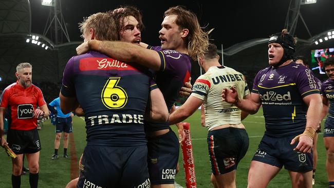 MELBOURNE, AUSTRALIA - JULY 20: Grant Anderson of the Storm celebrates with Ryan Papenhuyzen of the Storm after making a try saving tackle against Dominic Young of the Roosters during the round 20 NRL match between Melbourne Storm and Sydney Roosters at AAMI Park, on July 20, 2024, in Melbourne, Australia. (Photo by Kelly Defina/Getty Images)