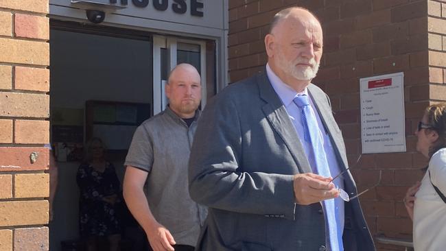 Kurt Cunningham (behind) leaves Belmont Court House with his lawyer (front). Picture: Emily Burley.