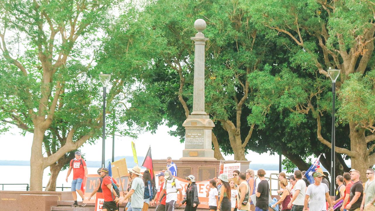 Protesters congregate at the Cenotaph at a Free in the NT march in Darwin. Picture: Glenn Campbell